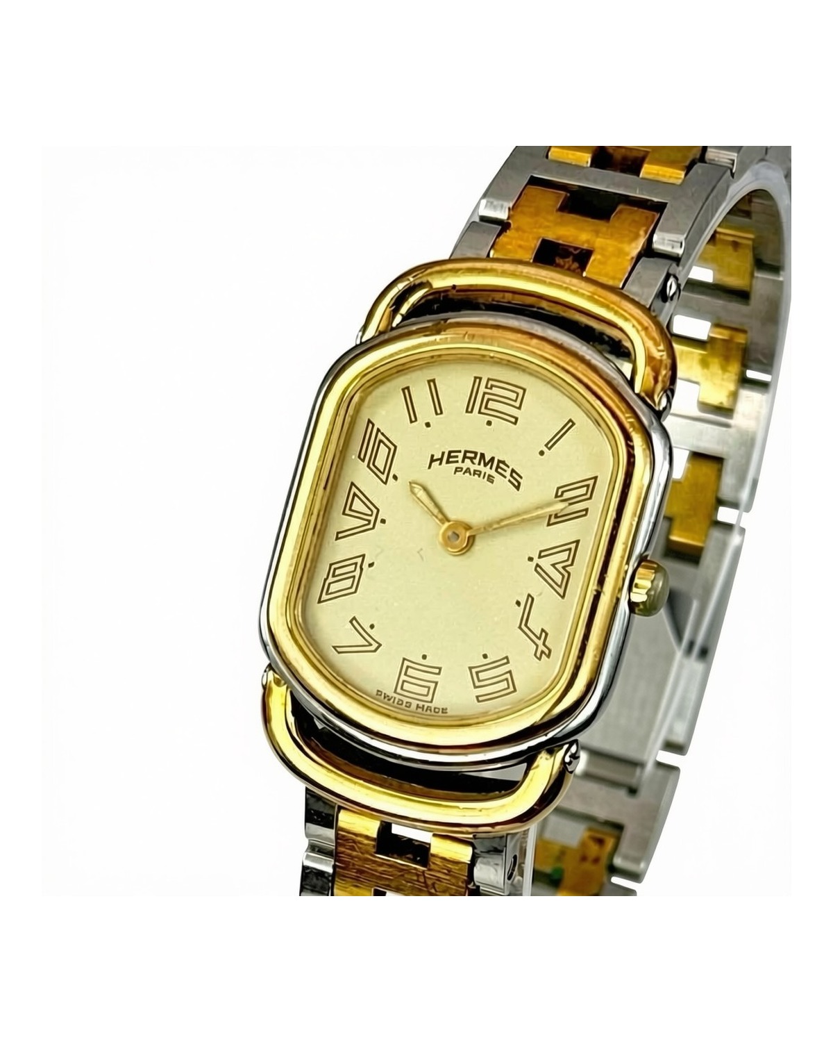 Hermès Rally ivory dial tonneau watch with two-tone H-band